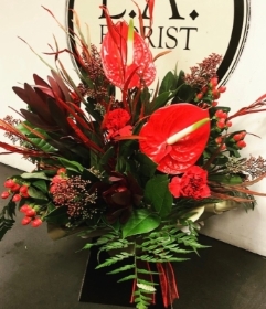 CRIMSON CHRISTMAS ARRANGEMENT